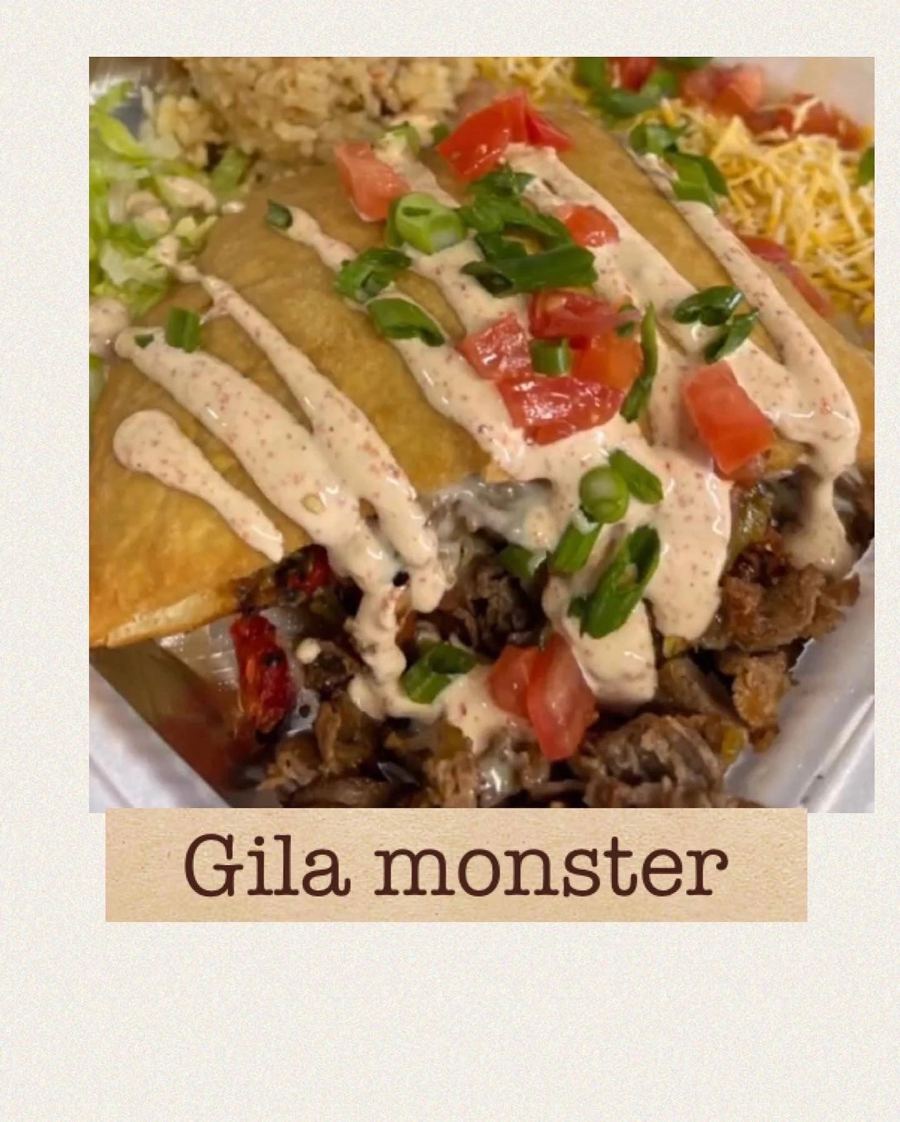 The Gila Monster: sopapilla stuffed with shaved rib eye and green chile, drizzled with spicy crema
