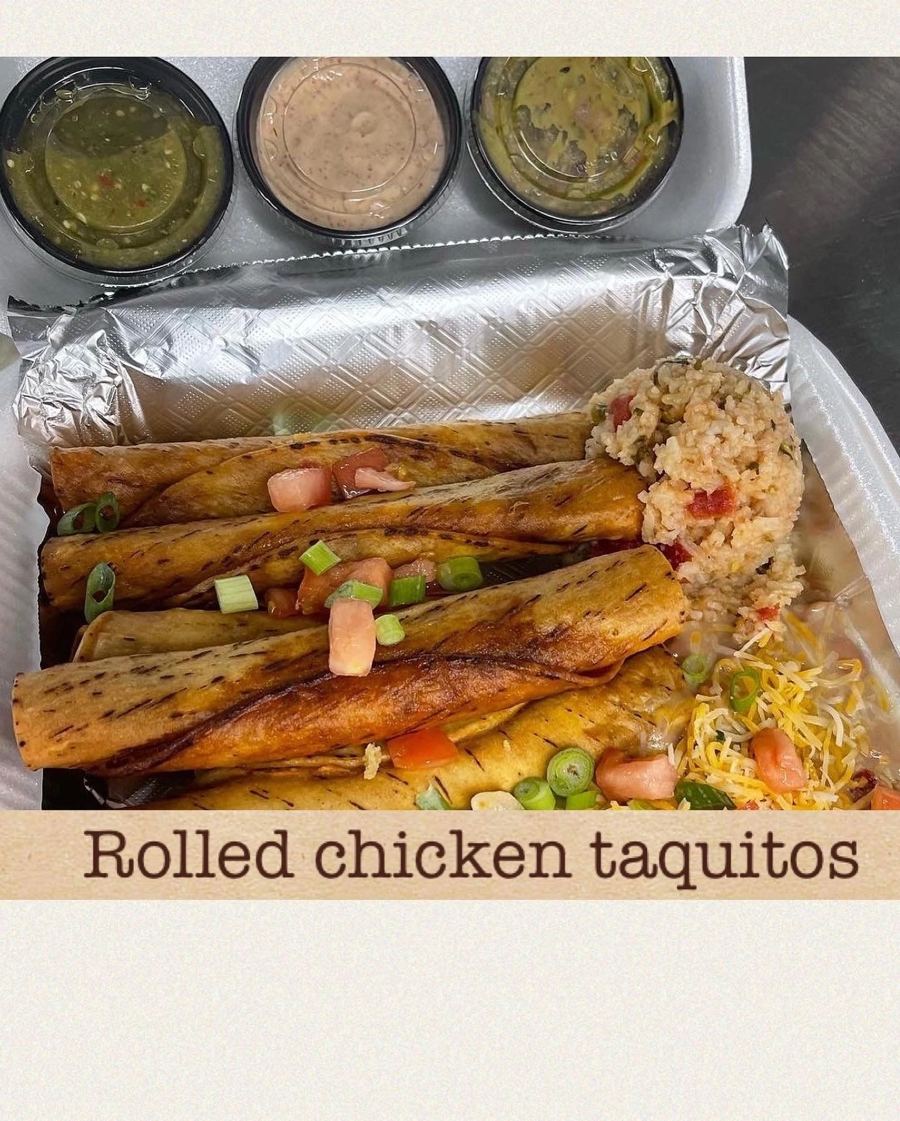 Five hand-rolled chicken taquitos with rice, guacamole and salsa
