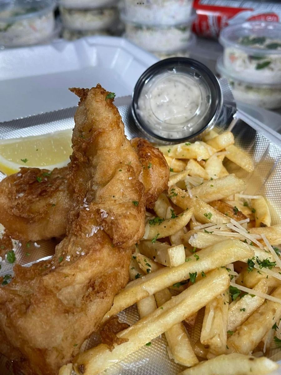 Beer-battered fish and chips with lemon