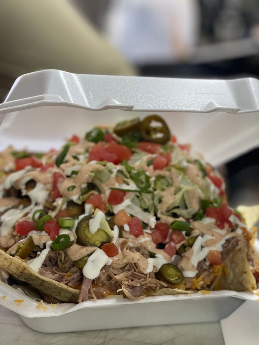 Pulled pork special loaded with jalapeños and crema
