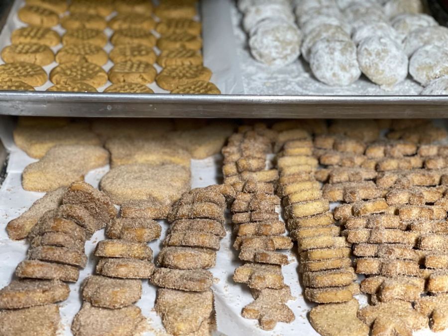 Trays of homemade cookies and biscochitos