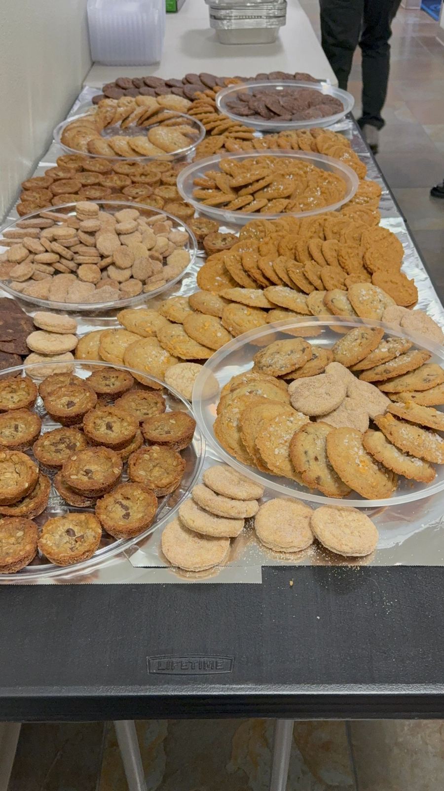 Platters of assorted homemade cookies at an event